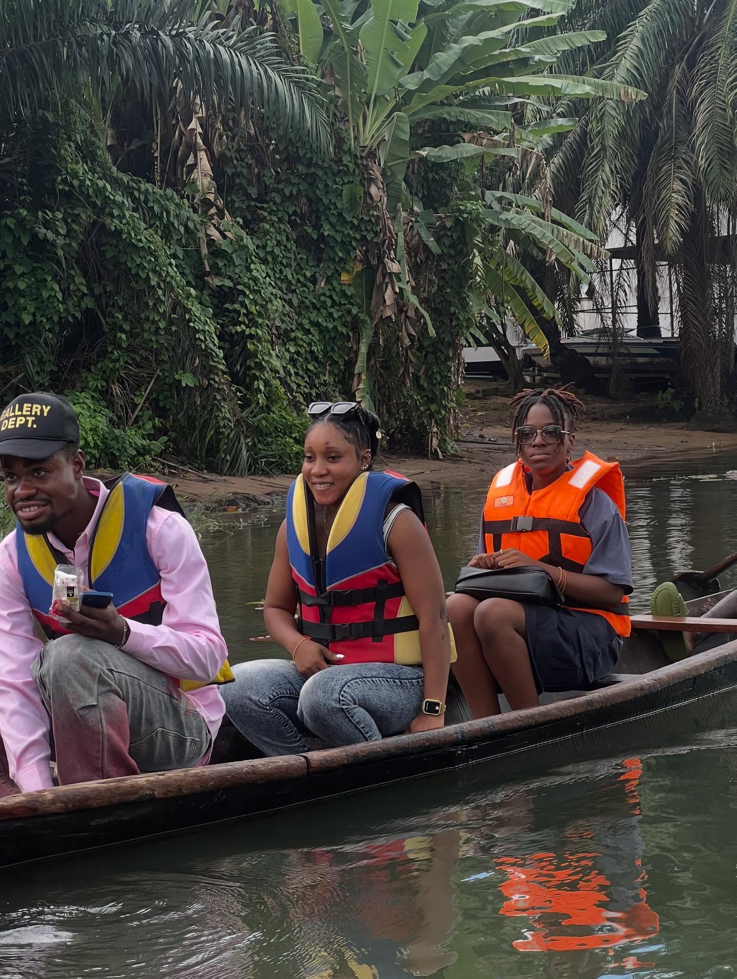 Travellers on a canoe ride during the trip